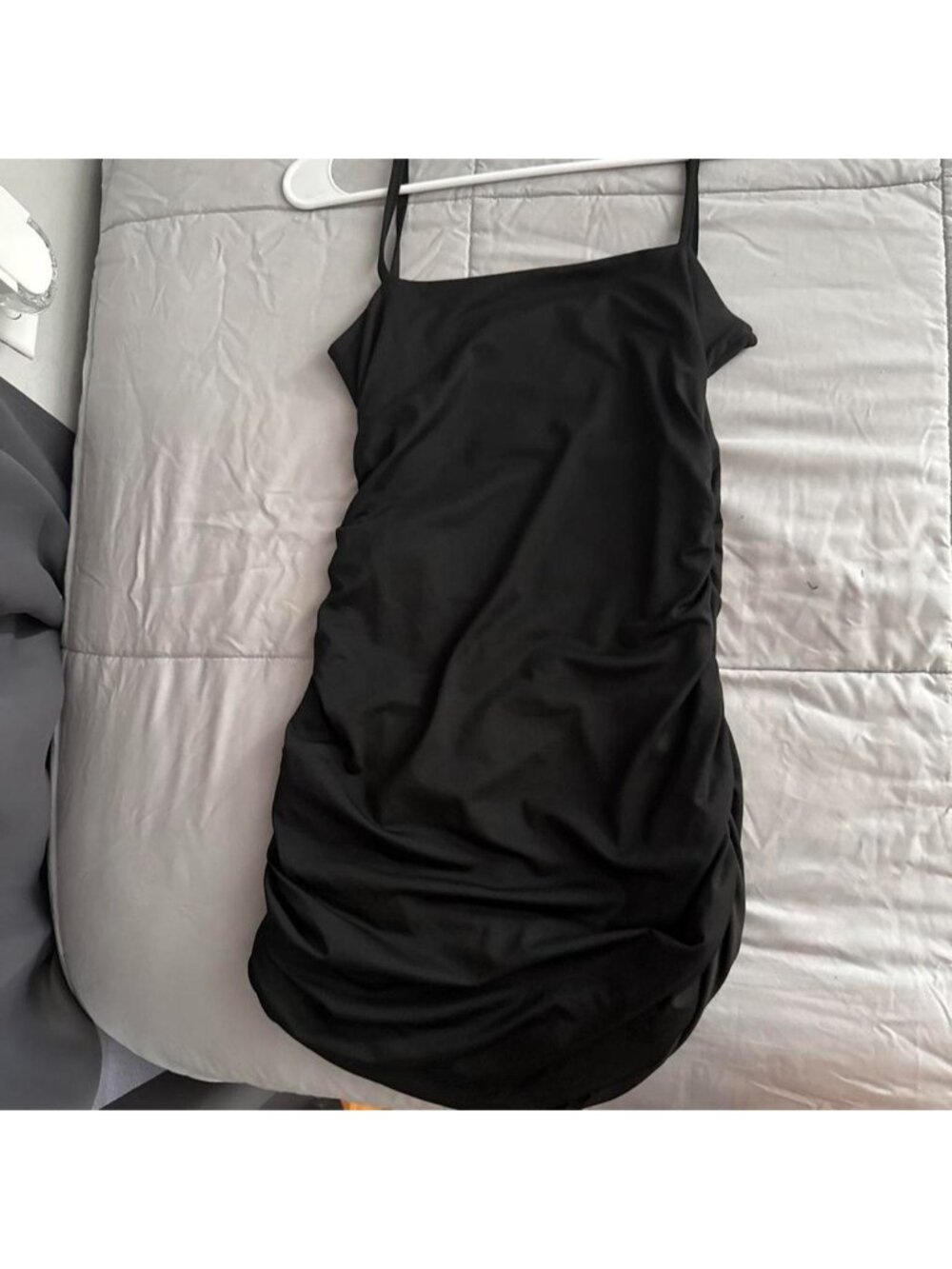 Black mini dress with ruched detailing #mini #ruched